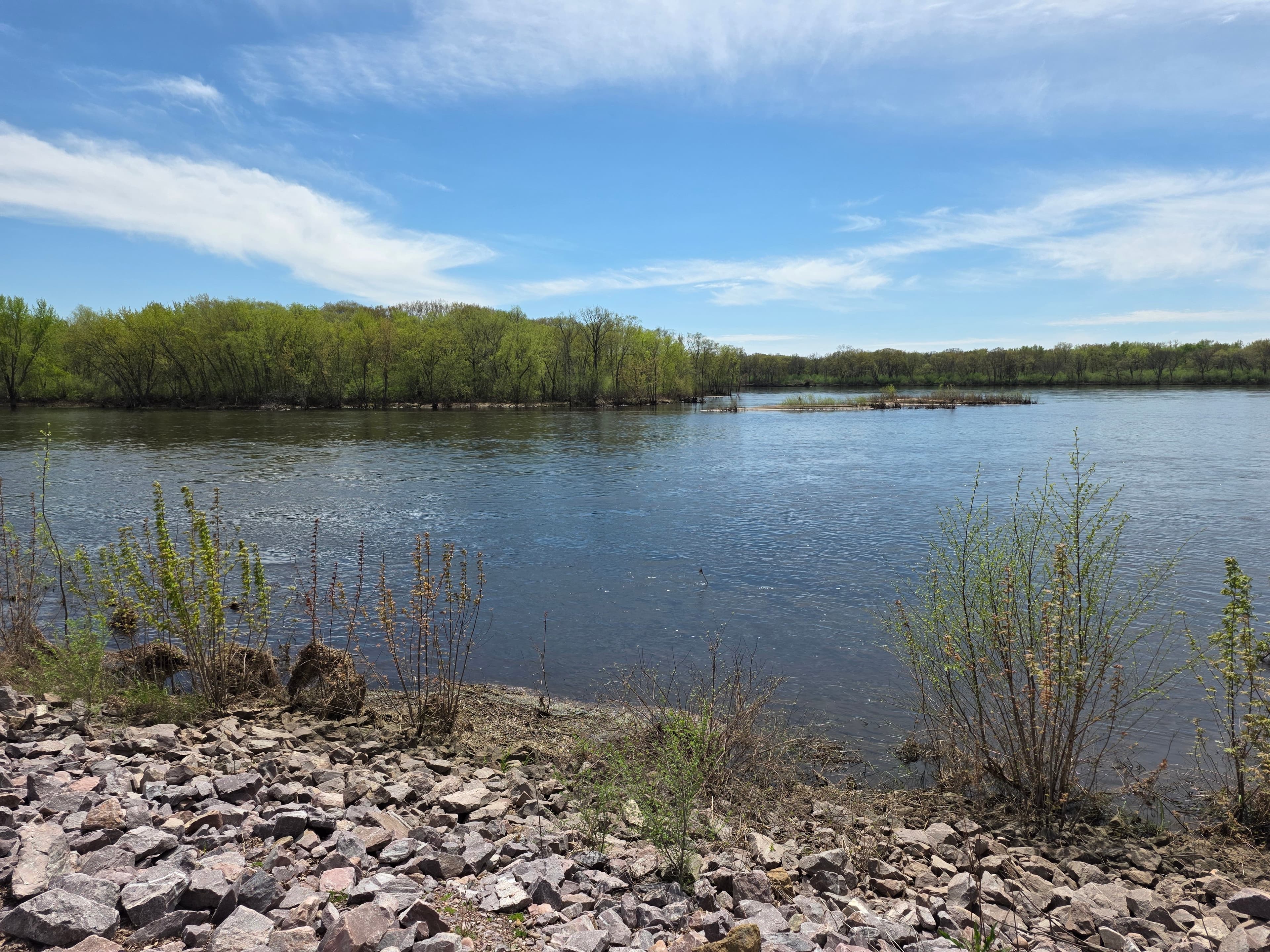 Junk removal service in Portage, WI — scenic Wisconsin River with tree-lined banks