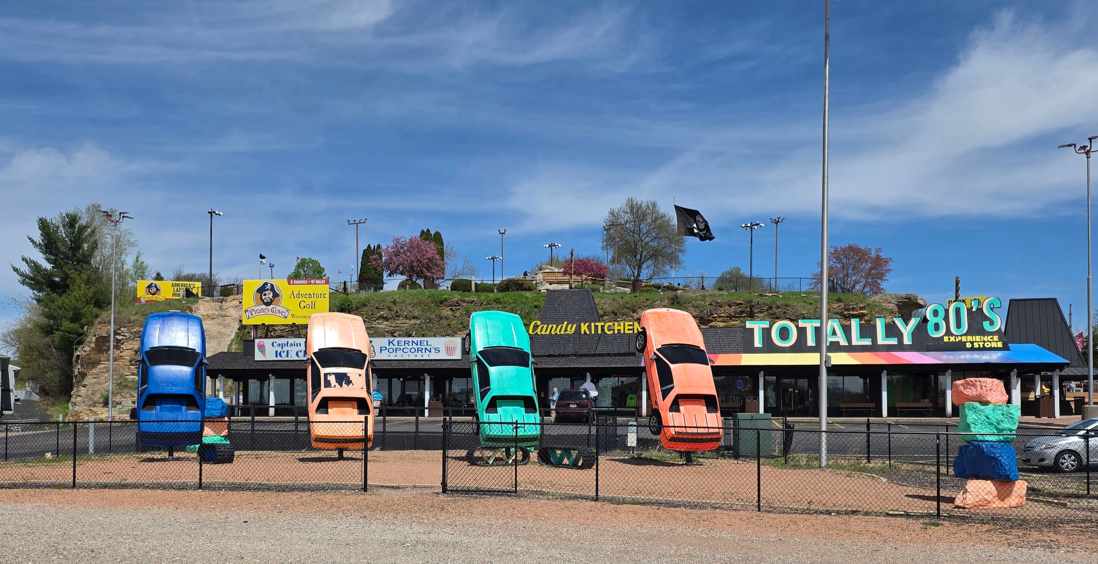Wisconsin Dells roadside attractions with colorful vintage cars display